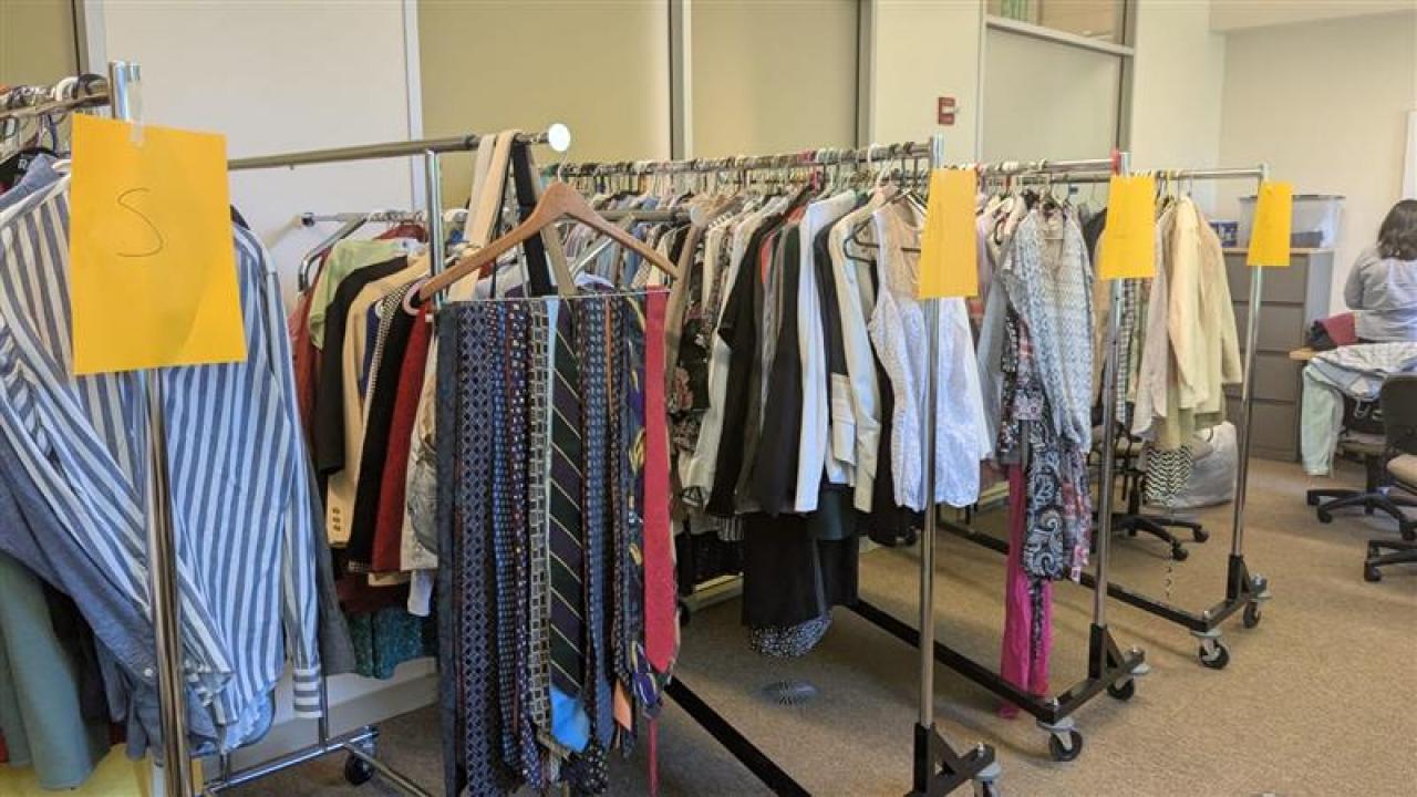 Business Boutique Clothes Hanging On Racks